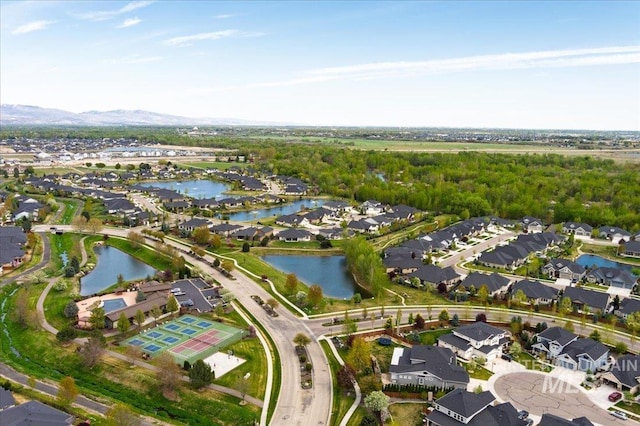 bird's eye view with a water view and a residential view