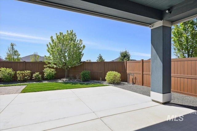 view of patio featuring a fenced backyard