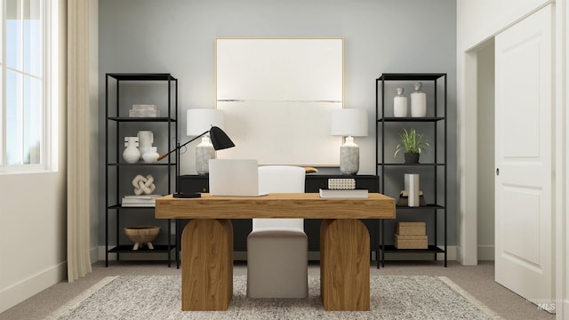 office with baseboards and carpet floors