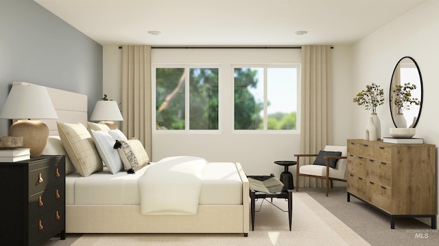 bedroom with light colored carpet