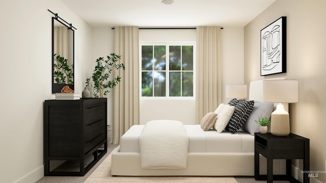 bedroom featuring baseboards