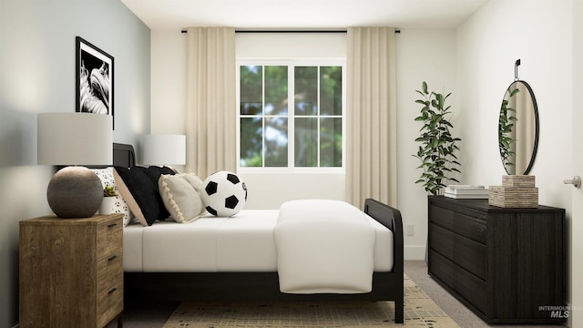 bedroom with light carpet