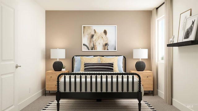 bedroom featuring carpet flooring and baseboards