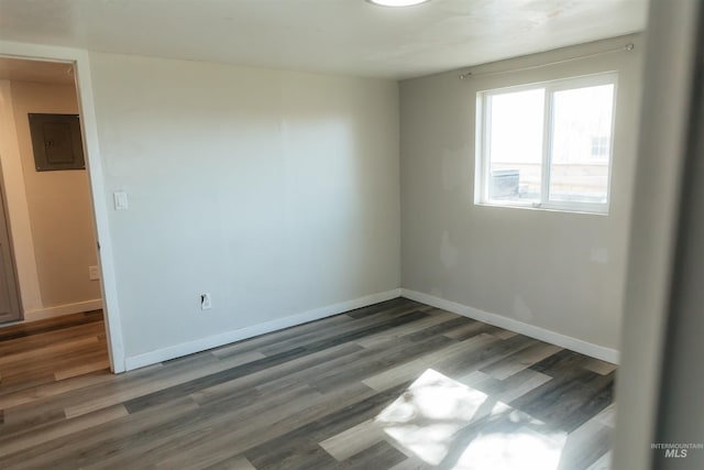 85 E Central Blvd, Cambridge, ID 83610 - empty room featuring electric panel, wood finished floors, and baseboards