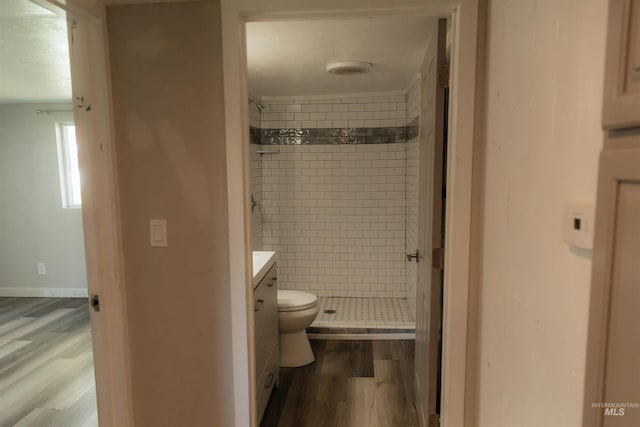 85 E Central Blvd, Cambridge, ID 83610 - full bath featuring a shower stall, wood finished floors, toilet, vanity, and baseboards