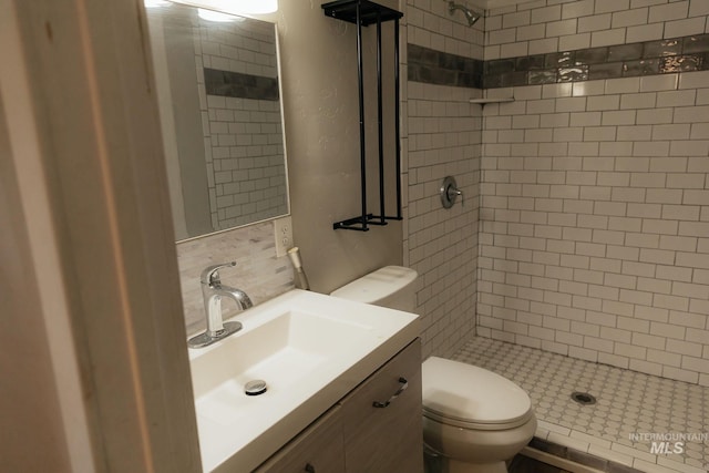 85 E Central Blvd, Cambridge, ID 83610 - bathroom with toilet, a stall shower, backsplash, and vanity