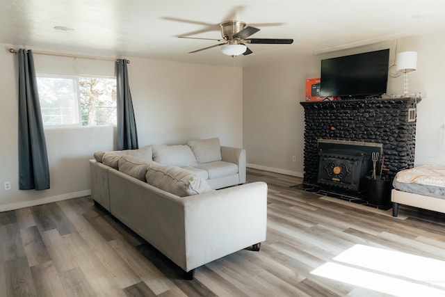 85 E Central Blvd, Cambridge, ID 83610 - living room featuring wood finished floors, ceiling fan, and baseboards
