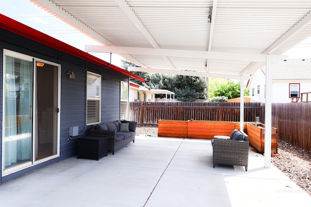 view of patio / terrace with fence and outdoor lounge area