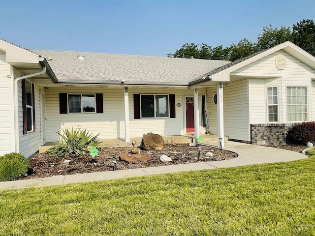 ranch-style house with a front yard