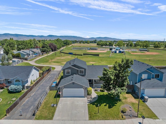 5174 N Rothmans Ave, Boise, ID 83713 - aerial perspective of suburban area with a mountainous background