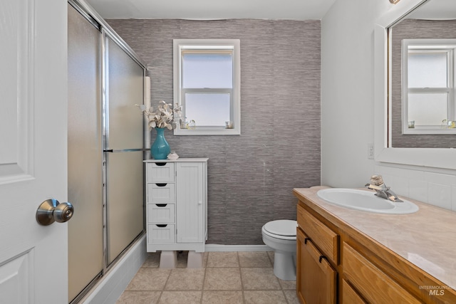 5174 N Rothmans Ave, Boise, ID 83713 - full bathroom with vanity, healthy amount of natural light, and tile patterned flooring
