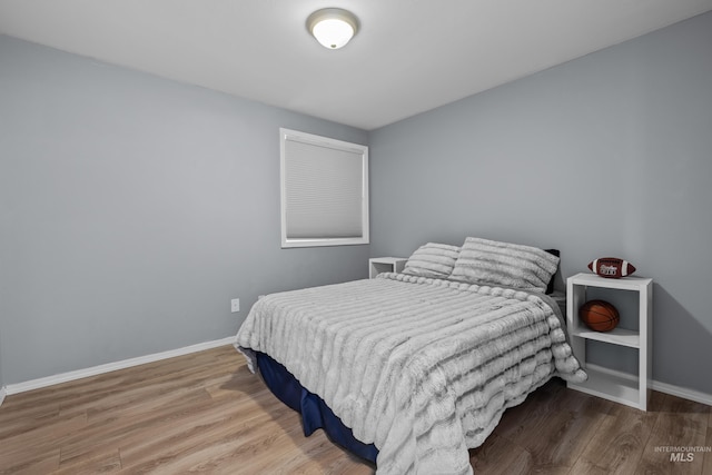 5174 N Rothmans Ave, Boise, ID 83713 - bedroom featuring wood finished floors and baseboards