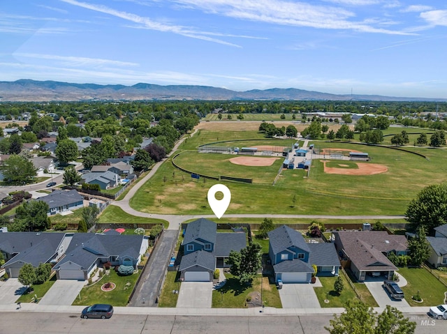 5174 N Rothmans Ave, Boise, ID 83713 - aerial perspective of suburban area with a mountainous background