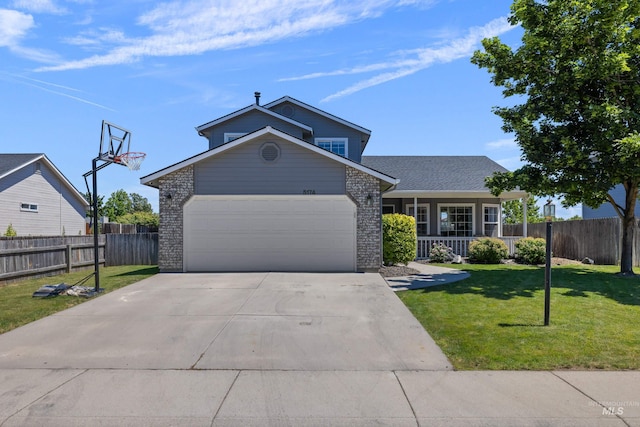 5174 N Rothmans Ave, Boise, ID 83713 - traditional-style house with brick siding, covered porch, a garage, and concrete driveway