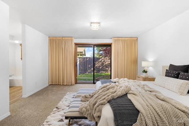 bedroom featuring carpet floors, access to exterior, and baseboards