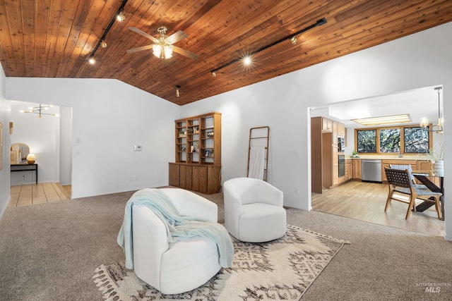 sitting room featuring rail lighting, light carpet, lofted ceiling, and wooden ceiling