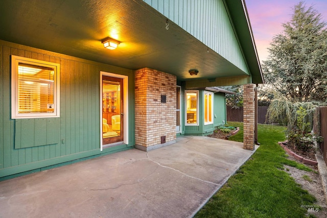 view of patio / terrace with covered porch and fence