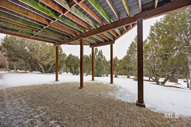 view of yard layered in snow