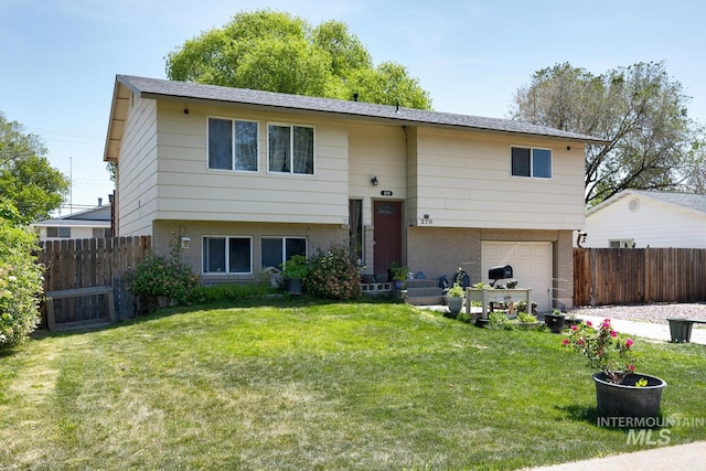 370 S 10th E, Mountain Home, ID 83647 - bi-level home with brick siding, an attached garage, and central AC