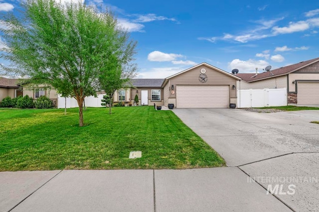 single story home with a garage and a front lawn