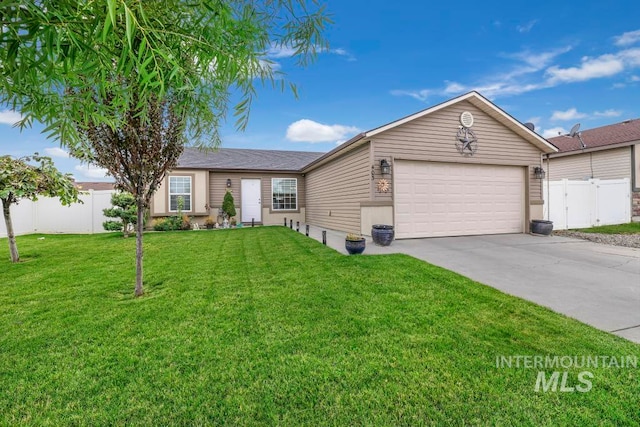 ranch-style house featuring a garage and a front lawn