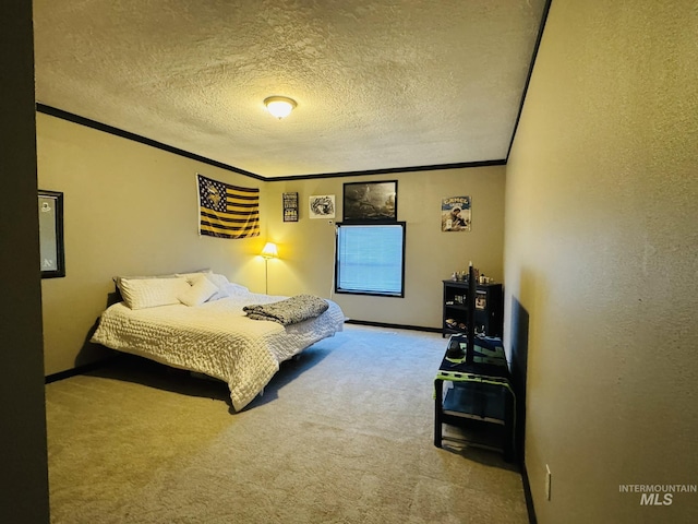 bedroom with baseboards, a textured wall, ornamental molding, a textured ceiling, and carpet floors