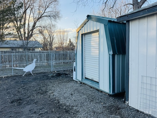 view of outdoor structure featuring an outdoor structure and fence