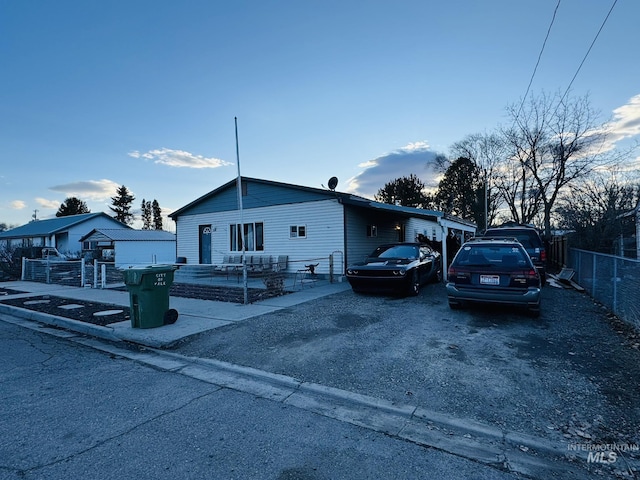 view of front facade with fence