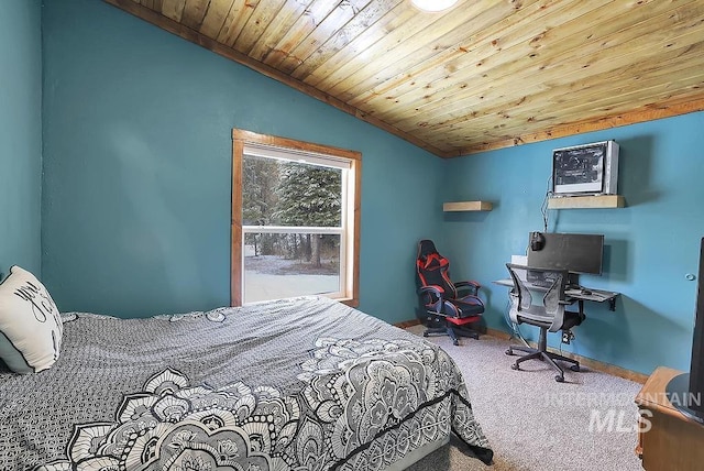 bedroom featuring carpet floors, wood ceiling, and lofted ceiling