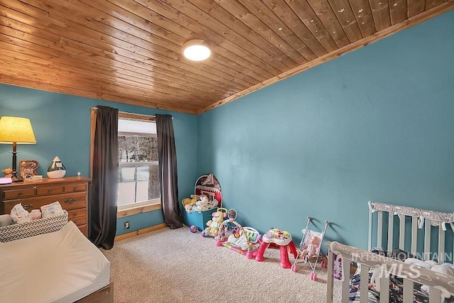 carpeted bedroom featuring wood ceiling and crown molding