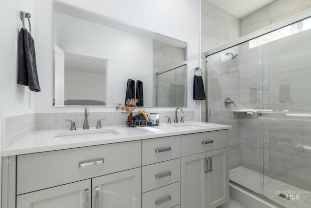 4541 E Fortuna Dr, Nampa, ID 83687 - bathroom featuring double vanity and a stall shower