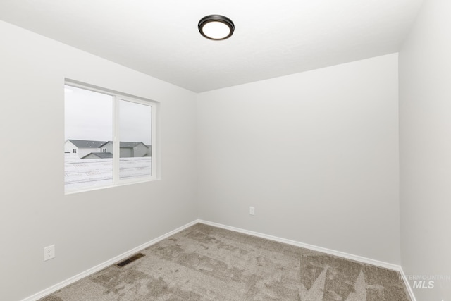 2887 N Rocky Bottom Way, Kuna, ID 83634 - spare room with carpet flooring and baseboards