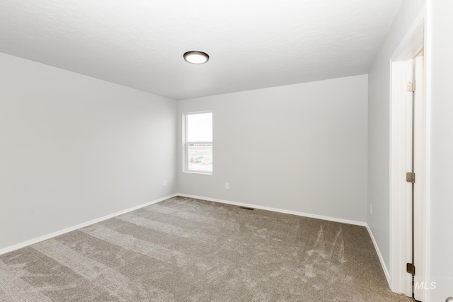 2887 N Rocky Bottom Way, Kuna, ID 83634 - carpeted empty room featuring baseboards