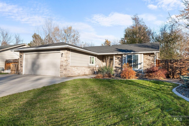 ranch-style home featuring a front yard and a garage