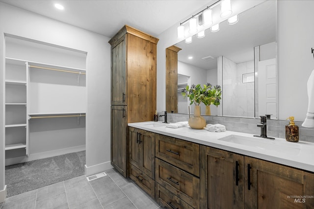 bathroom featuring vanity and tile patterned floors