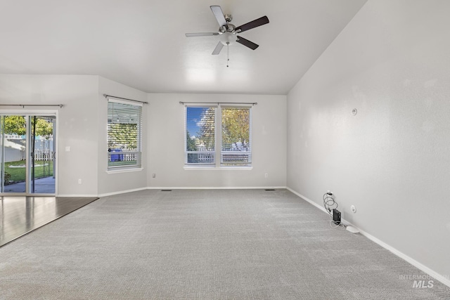 unfurnished room with carpet, baseboards, and ceiling fan