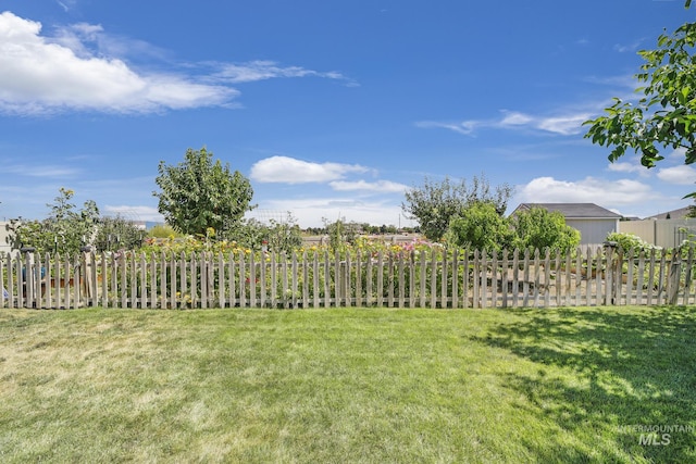 view of yard with fence