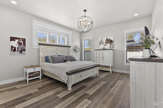 518 Bass Run Ln, Marsing, ID 83639 - bedroom with a chandelier, dark wood-type flooring, and recessed lighting