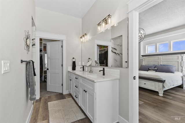 518 Bass Run Ln, Marsing, ID 83639 - ensuite bathroom featuring vanity and wood finished floors