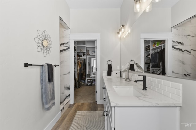518 Bass Run Ln, Marsing, ID 83639 - bathroom with double vanity, wood finished floors, and a spacious closet
