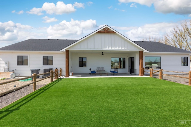 518 Bass Run Ln, Marsing, ID 83639 - rear view of property featuring ceiling fan, board and batten siding, a patio, and a fenced backyard