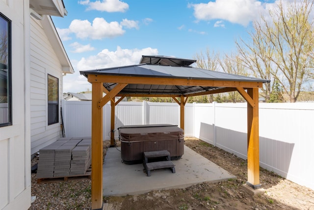 518 Bass Run Ln, Marsing, ID 83639 - fenced backyard with a hot tub, a gazebo, and a patio area