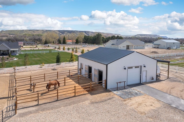 518 Bass Run Ln, Marsing, ID 83639 - view of outbuilding featuring an exterior structure, a view of rural / pastoral area, and asphalt driveway
