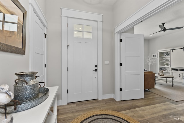 518 Bass Run Ln, Marsing, ID 83639 - foyer entrance featuring wood finished floors and ceiling fan