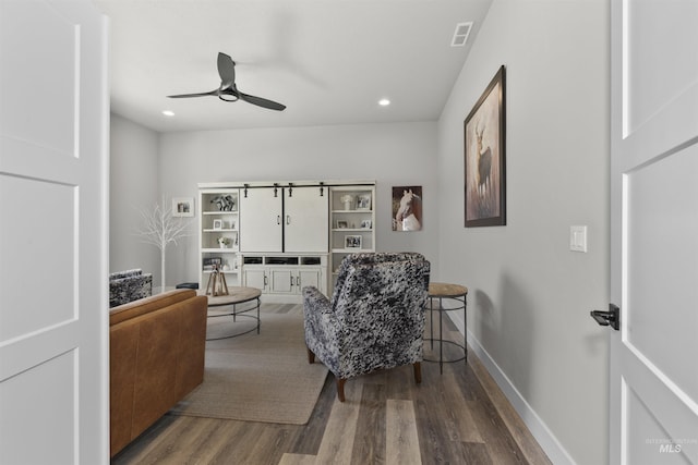 518 Bass Run Ln, Marsing, ID 83639 - sitting room with wood finished floors, ceiling fan, and recessed lighting