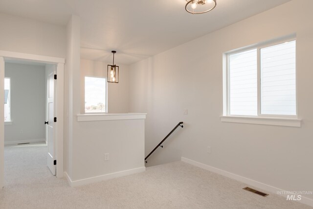 unfurnished living room featuring ceiling fan, light hardwood / wood-style floors, and sink