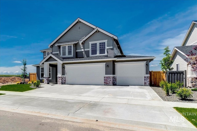 craftsman house with a garage