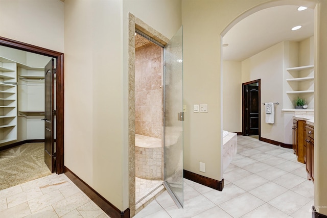 2634 W Sugarberry Dr, Eagle, ID 83616 - bathroom with a stall shower, built in shelves, vanity, and baseboards