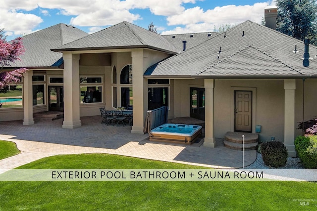 2634 W Sugarberry Dr, Eagle, ID 83616 - back of house with a patio, stucco siding, a chimney, and a shingled roof