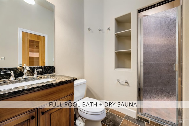 2634 W Sugarberry Dr, Eagle, ID 83616 - full bathroom featuring toilet, vanity, and a shower with shower door